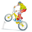boy practicing bike pirouettes