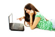 Surprised girl with laptop. Pointing at it