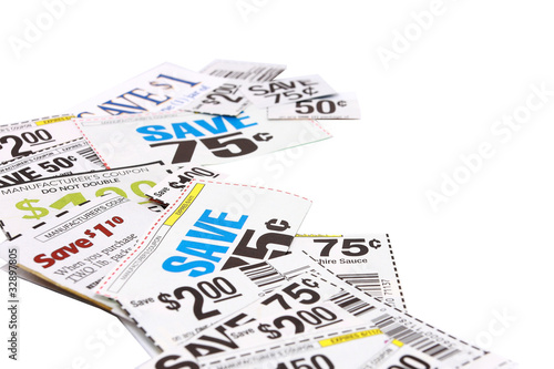 Photo: Assorted Grocery Coupons On White Background Assorted Grocery Coupons On White Background