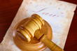 Judges gavel with old paper