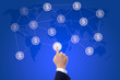 business man hand pressing button of money network