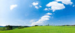 Green madow and bue sky