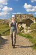 Hiker in badlands of Alberta, Canada