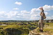 Hiker in badlands of Alberta, Canada