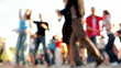 Couples Latin dancing in the street