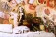 portrait of young blond woman in bed on art background portrait of young blond woman in bed on art background