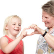 Photo: Grandmother playing games with her cute granddaughter Grandmother playing games with her cute granddaughter