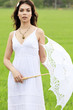 Beautiful bride posing outdoors.