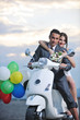 just married couple on the beach ride white scooter just married couple on the beach ride white scooter