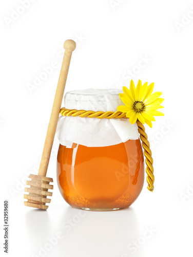Photo: honey jar with wooden dripper honey jar with wooden dripper