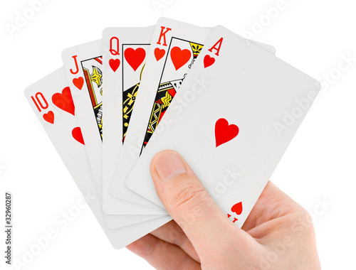 Foto: Playing cards in hand Playing cards in hand