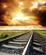railway to cloudy sky at sunset railway to cloudy sky at sunset