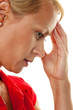 Pensive woman with headache