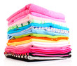 Pile of colorful clothes over white background