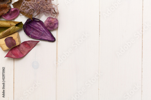 Photo: potpourri and wood background potpourri and wood background