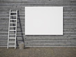 Blank advertising billboard on wall