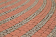 Curved paving stone road