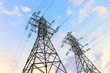 High voltage electric power supplay lines with bright sunset clo