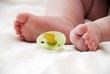 Babyfeet with pacifier