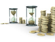 sand clocks with stack of coins