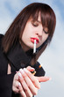 young elegant girl with a cigarette