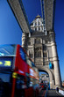 Tower Bridge with red bus in London, UK