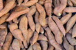 Background Of Yam (Sweet Potato) Vegetables At A Market