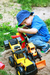 Foto: Boy playing with digger Boy playing with digger