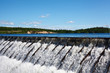 Owerflow of water on the man-made storage pond
