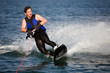sliding wakeboarder in water splash sliding wakeboarder in water splash