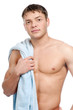 A young man with a towel