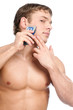 Foto: Portrait of a young handsome man shaving Portrait of a young handsome man shaving