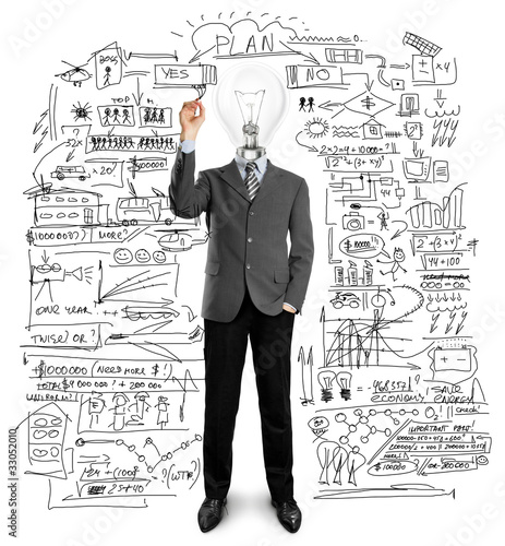Foto: lamp head businessman writing something lamp head businessman writing something
