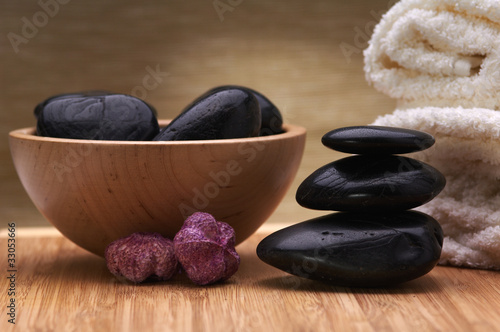 Photo: spa towel. black balanced hot stones spa towel. black balanced hot stones