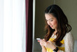 Woman - type on mobile phone