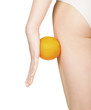 beautiful female figure with orange, isolated on white beautiful female figure with orange, isolated on white