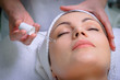 pretty woman getting special skin treatment at beauty salon