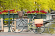 Bike parked on a bridge in Amsterdam, Netherlands