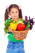 Little girl with basket of vegetables