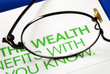 Focus on growth in wealth isolated on blue