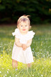 Foto: Little girl in a meadow Little girl in a meadow