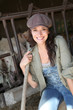Portrait of smiling farmer in barn