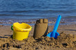 Sandspielzeug am Sandstrand Sandspielzeug am Sandstrand