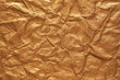 Foto: Crumpled gold paper Crumpled gold paper