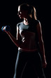 Photo: Beautiful sport woman doing power fitness exercise Beautiful sport woman doing power fitness exercise