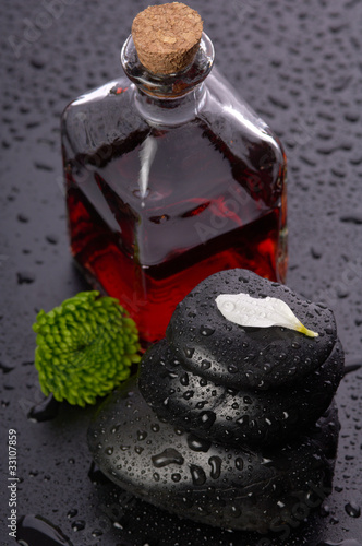 Photo: balanced stones and essential oil balanced stones and essential oil