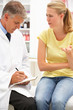 Doctor with female patient