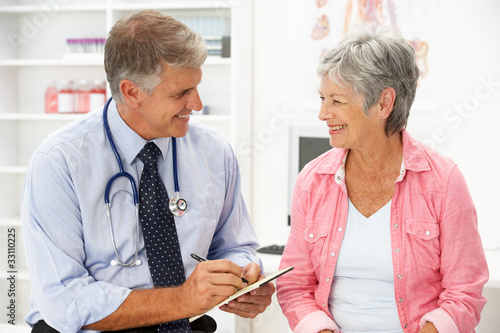 Photo: Doctor with female patient Doctor with female patient