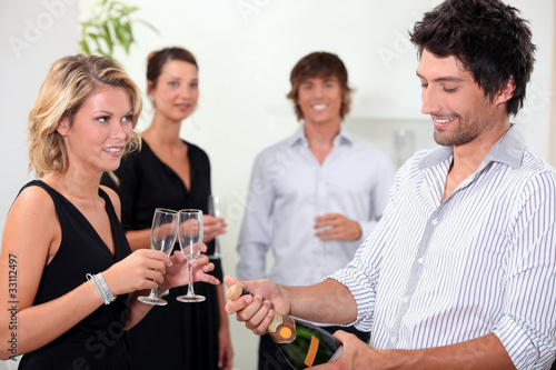 Photo: Popping the champagne Popping the champagne