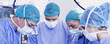 Surgeons in operation